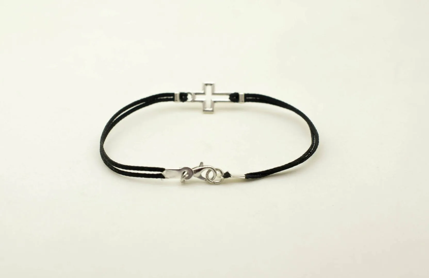 Men's bracelet with silver outline cross pendant, black cord, Christian gift for him