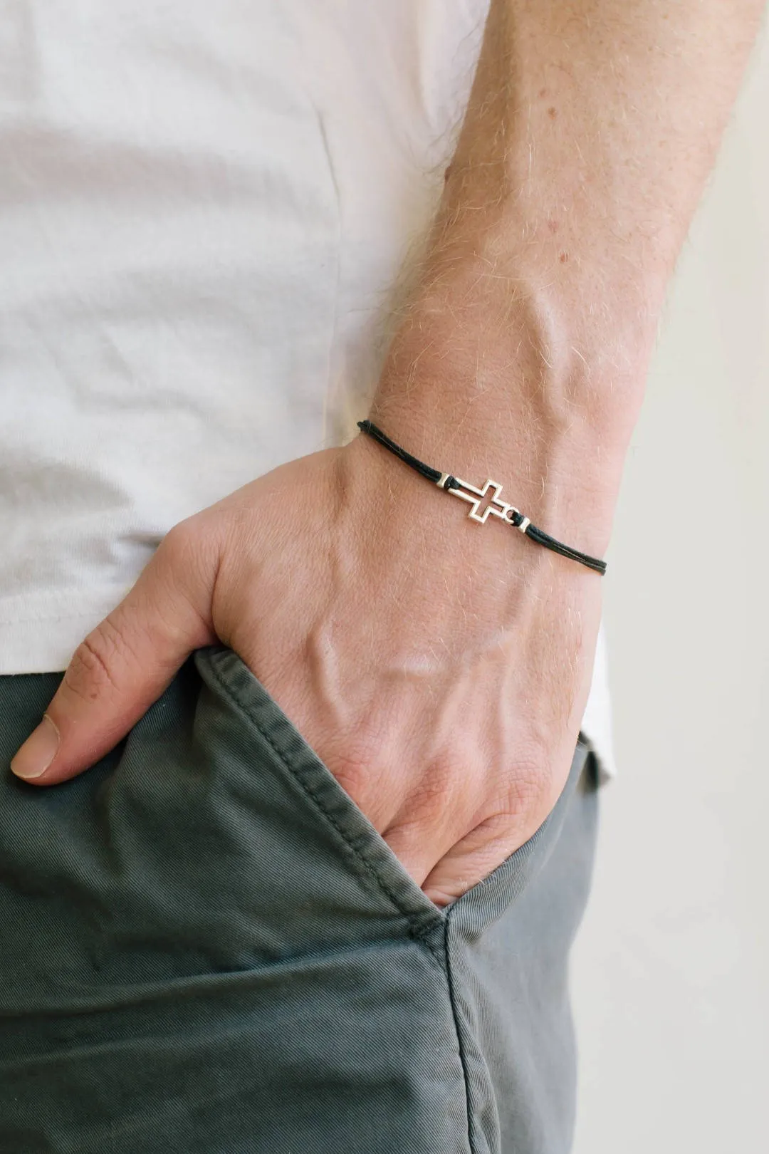 Men's bracelet with silver outline cross pendant, black cord, Christian gift for him