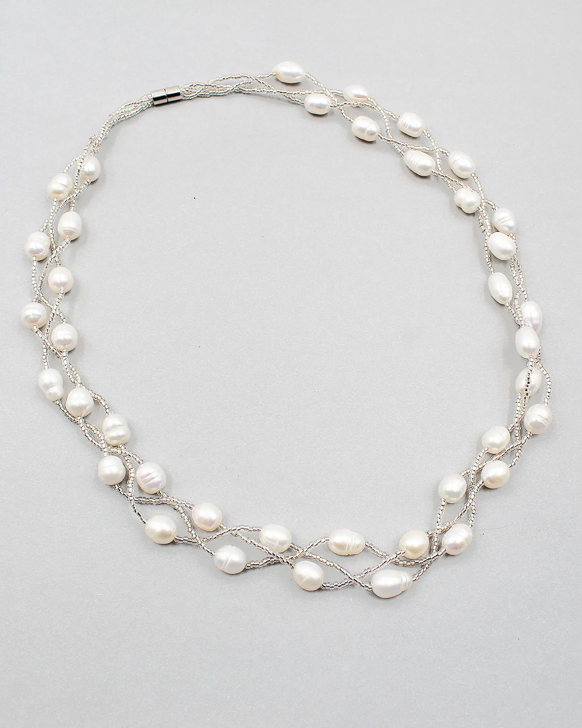 Triple Braided Elongated Pearl Necklace